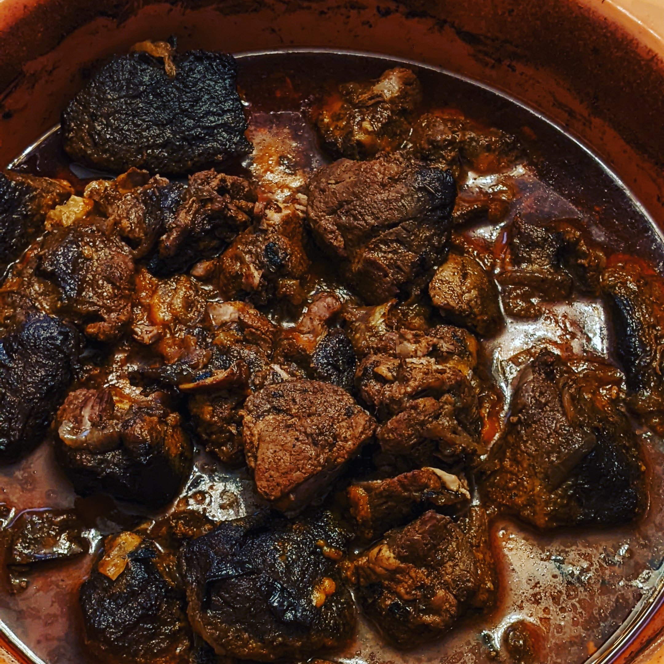 image of lamb curry in oven